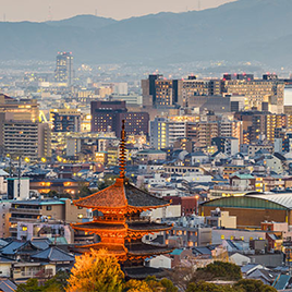 city view of Kyoto with mountains in background