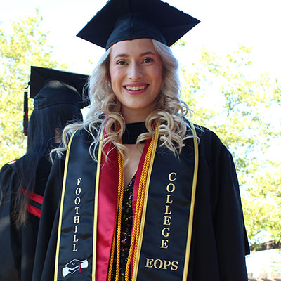 Female in graduation gown and cap