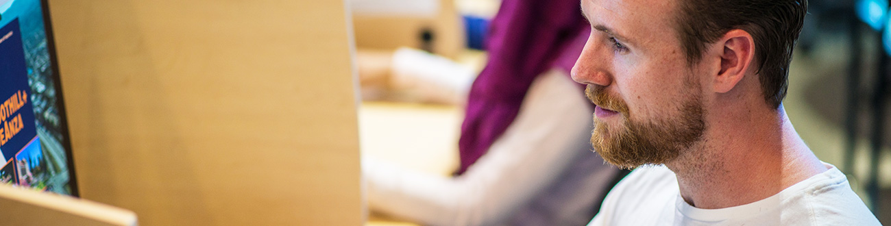 Female student looking at books