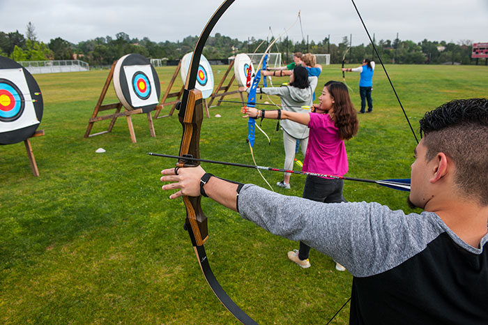 Four archery students 