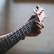 Hand on a guitar