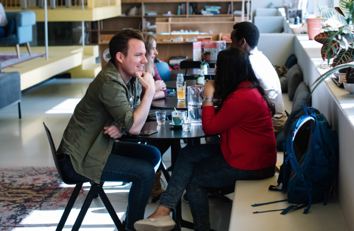 Students talking in a cafe